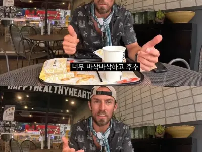 한국의 치킨버거를 맛보는 미국인.jpg